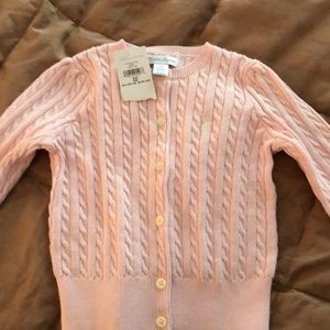 Ralph Lauren pink sweater.